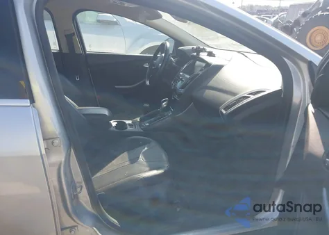 2013 Ford Focus Titanium z USA, uszkodzony, nr VIN 1FADP3J21DL378966